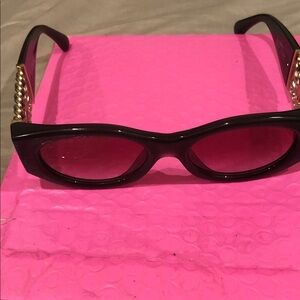 Chic Chanel Black Sunglasses with Gold Accents